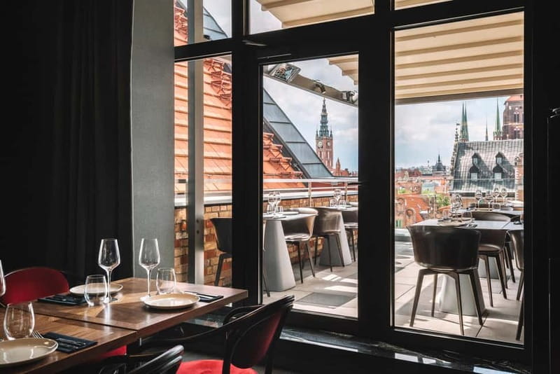 Asian Dinner Above the Rooftops of Gdańsk Old Town - Views Matter Here: Old Town Rooftops and Basilica Sightlines