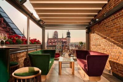 Asian Dinner Above the Rooftops of Gdańsk Old Town
