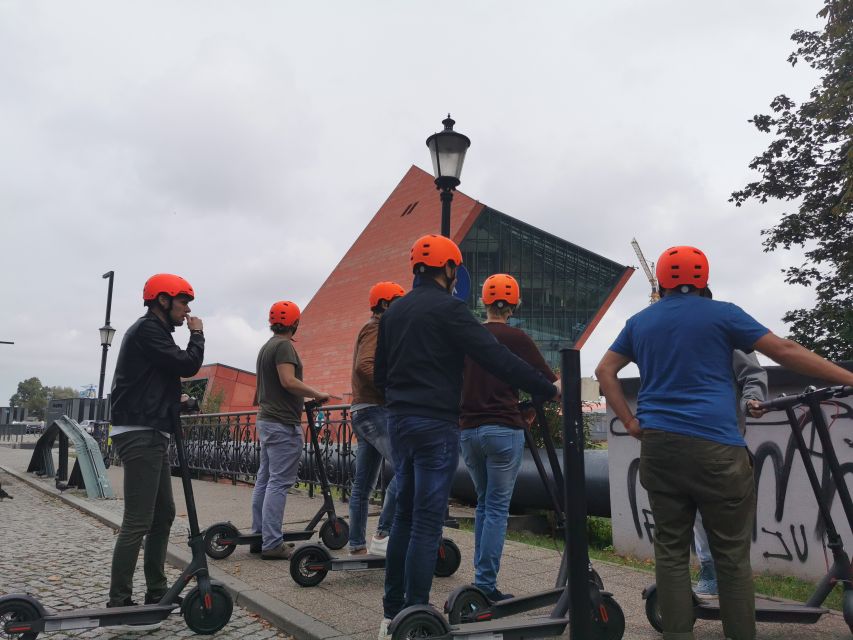 Electric Scooter Tour: Old Town Tour - 1,5-Hour of Magic! - Maria Skłodowska-Curie Monument and New Town Square Contrast
