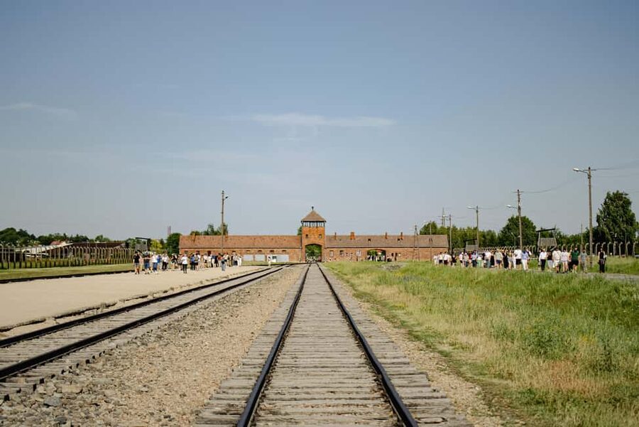 From Krakow: Auschwitz-Birkenau Live Guided Tour & Pickup - Skip-the-Line Entry, Security Checks, and What to Pack