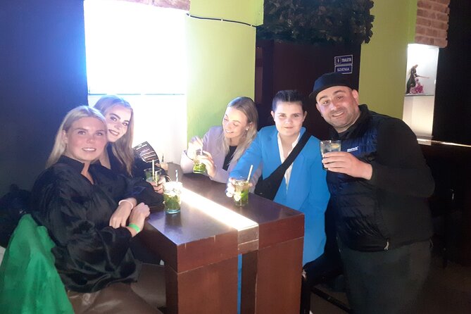 Fun Explorers Pub Crawl with free welcome shots and free ent - Stop 1 at Rynek Główny 30: a main-square start with a shot