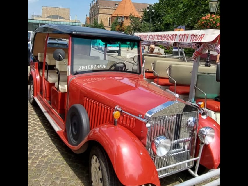 Gdańsk: City Tour by Electric Golf Cart - Gates, towers, and the armory stops that set the story