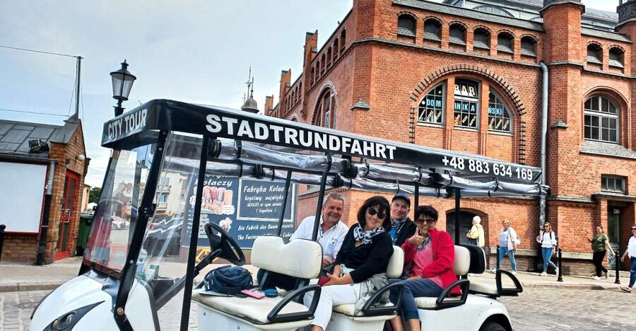 Gdansk: City Tour Live Guided by Golf Cart/Buggy Sightseeing - Where the tour starts and how pickup works in the city center