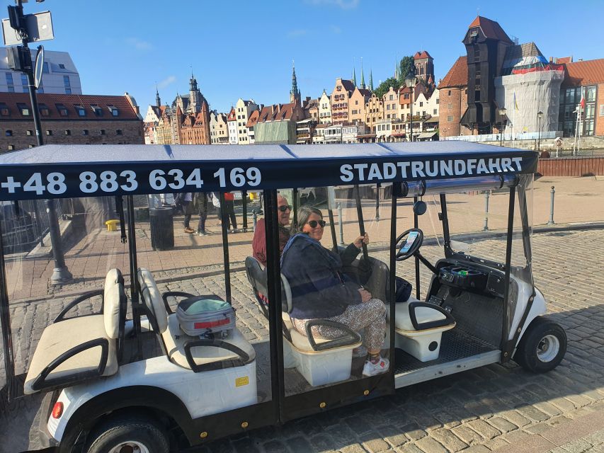 Gdansk: City Tour Live Guided by Golf Cart/Buggy Sightseeing - Motława river port views and the Great Harbor Crane