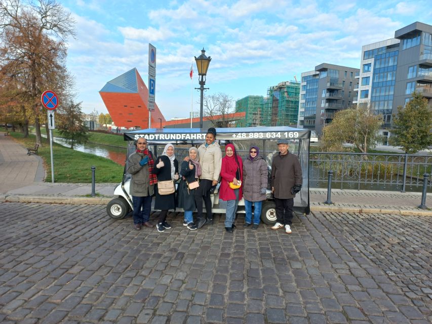 Gdansk: City Tour Live Guided by Golf Cart/Buggy Sightseeing - Shipyard and the working-city side of Gdansk
