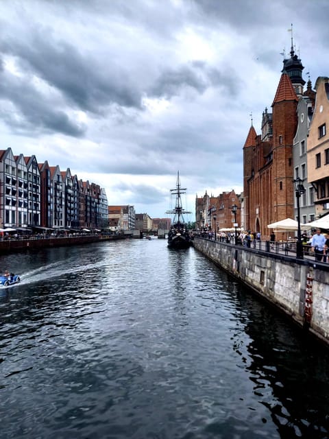 Gdansk: Guided Round-Trip Cruise to Westerplatte - Live music and sea-shanty energy on the return