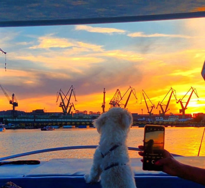 Gdańsk: Motława River Eco Cruise at Sunset with Prosecco - Gdańsk Shipyard at sunset: cranes, the red crane, and industrial romance