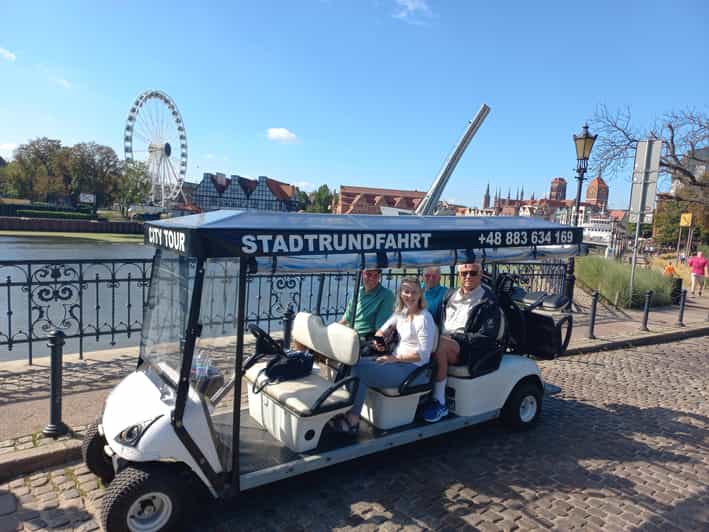 Gdansk: Private Top City Tour by Electric Cart & Live Guided - Churches in Gdansk: red bricks, Polish details, and the amber altar moment