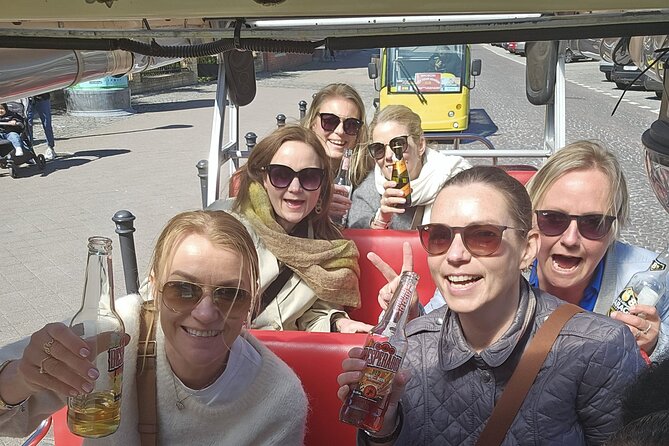 Gdansk Unlimited Beer Tour by GolfBuggy & Highlights & LiveGuided - Golden Gate of Gdansk and the old prison tower pause