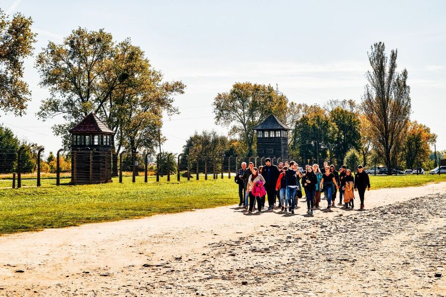 Krakow: Auschwitz-Birkenau Live Guided Tour & Hotel Pickup - Hotel pickup in Krakow plus a documentary on the ride