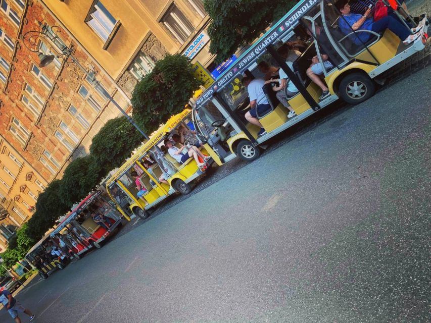 Krakow: City Sightseeing Tour Eco Electric Buggy Golf Cart - Audio guide and live narration: how to use both without zoning out