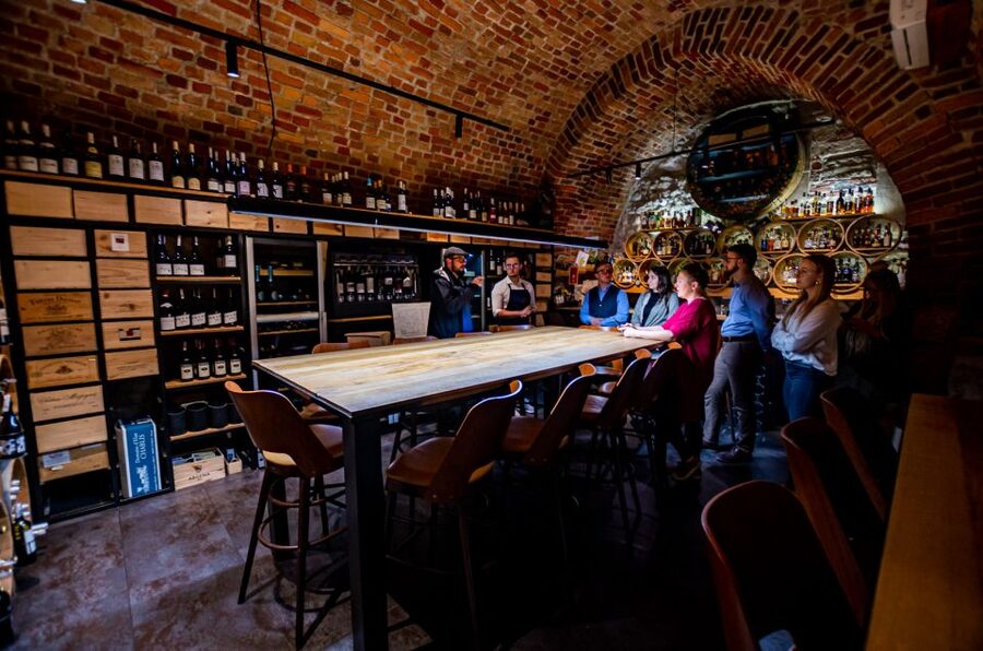 Krakow: Guided Wine Bar Tour with Tastings and Snacks - Stop 1: Your first 1-hour wine tasting and pairing