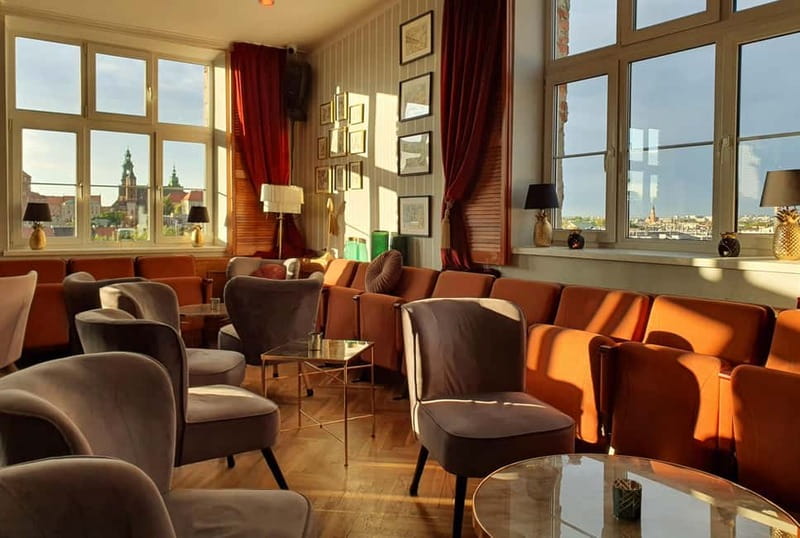 Krakow: Hidden Rooftop Bar Reservation with 1 Cocktail - Cocktails included: what to expect from the menu approach