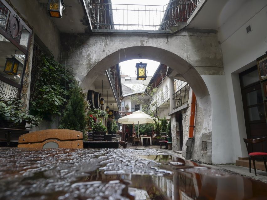 Krakow: Jewish Quarter and Schindler's Factory Guided Tour - Walking the Jewish Quarter’s Key Institutions, Synagogues, and Old Cemeteries