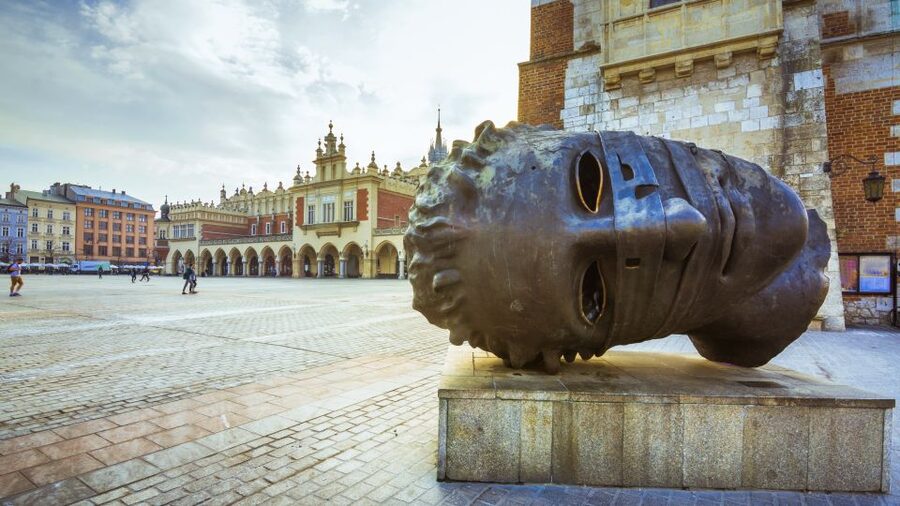 Krakow: Old Town Audio-Guided Walking Tour with Headset - Entering Krakow’s UNESCO Old Town with a headset guide