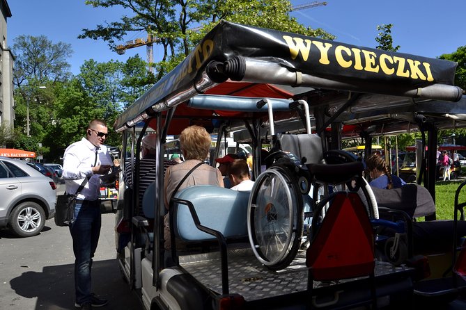 Krakow: Private Guided City Tour by Electric Car - Getting your bearings with an electric car in Krakow