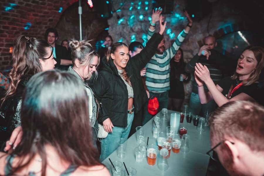 Krakow: Pub Crawl with 1 Hour of Unlimited Alcoholic Drinks - Drinking games that turn strangers into a group