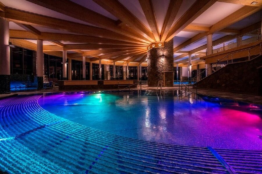 Krakow: Thermal Baths Evening Experience - Inside the baths: eight whirlpools plus slide-and-splash fun