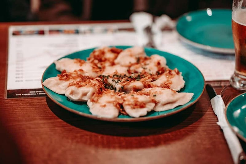 Krakow: Tipsy Polish Food Tour With History, Pierogi & Shots - Bigos, Pickles, and Smalec: The Hearty Middle Stops