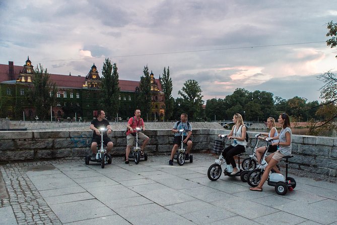 The Classic E-Scooter (3 wheeler) Tour of Wroclaw - everyday tour at 6:00 pm - Scooter comfort, helmets, and headset clarity