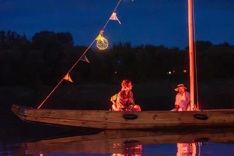 Toruń: Toruń at Night from a Boat on the Vistula - The Comfort System That Makes a Night Cruise Work