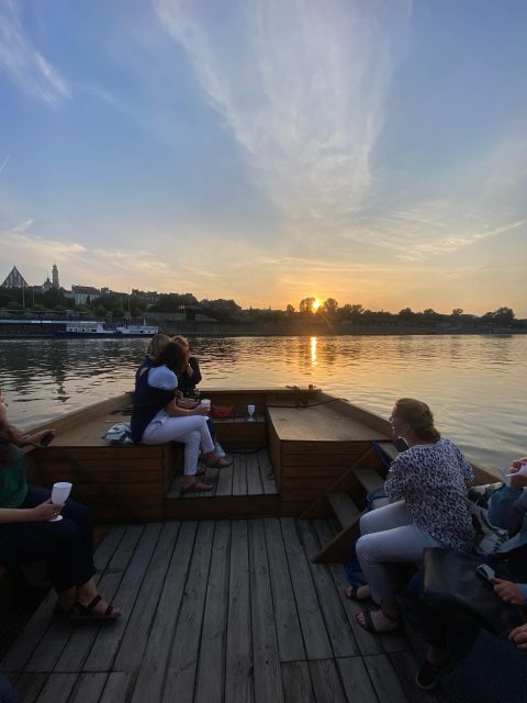 Warsaw: Evening Vistula Cruise with Welcome Drink - A wooden boat setup that works in real weather