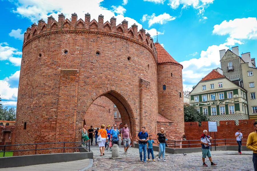 Warsaw: Old Town Highlights Walking Tour in English - Krakowskie Przedmieście and the Old Town, colorful streets with a purpose