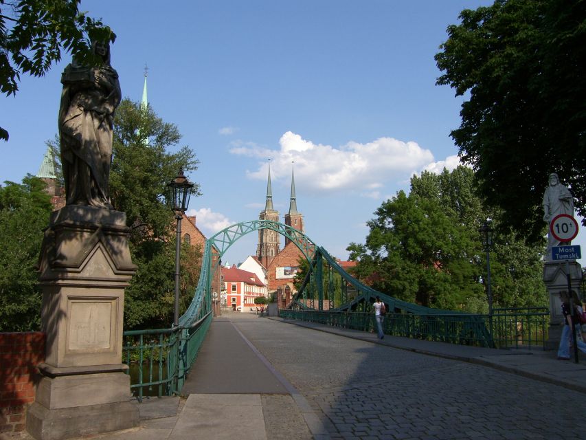 Wroclaw: 2-Hour Private Electric Bus Tour with Guide or Tape - The ride out of Plac Solny and the Jewish Quarter highlights