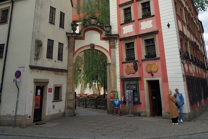Wrocław’s Old Town: A Self-Guided History Tour - Market Hall and Local Shopping Energy