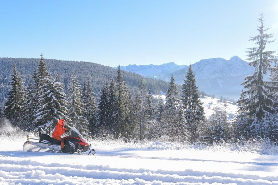 Zakopane: Snowmobiles Expedition and Optional Bonfire - Following the guide across Tatra terrain you cannot reach on foot